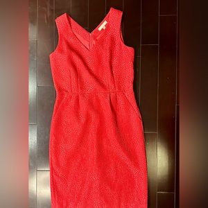 Beautiful dress in orange/reddish crêpe, sleeveless with back zipper .